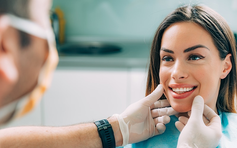 Dentist with Female Patient